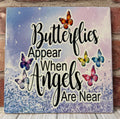 Ceramic Tile Butterflies appear
