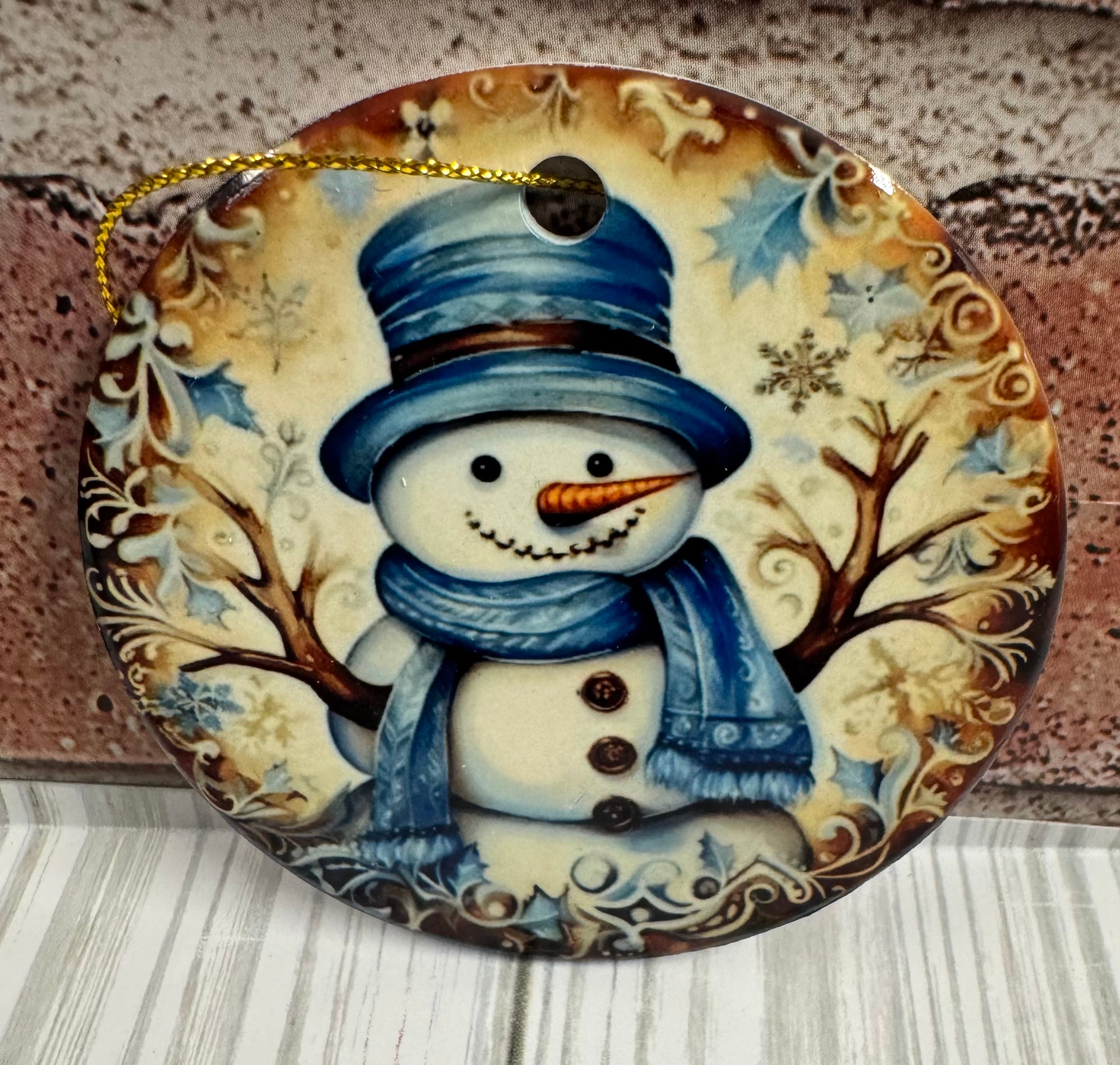 Ceramic Christmas Ornament Snowman with blue hat and leaves